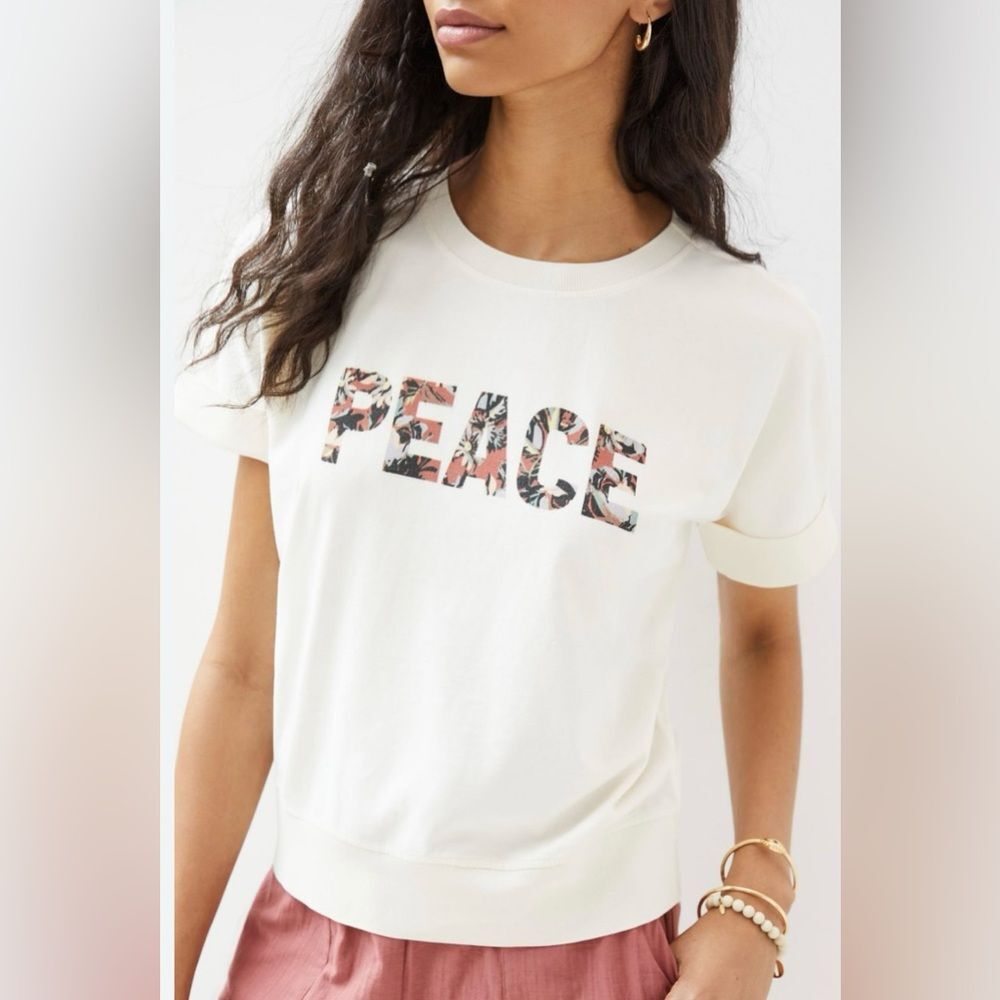 Anthropologie short cuffed sleeve peace top